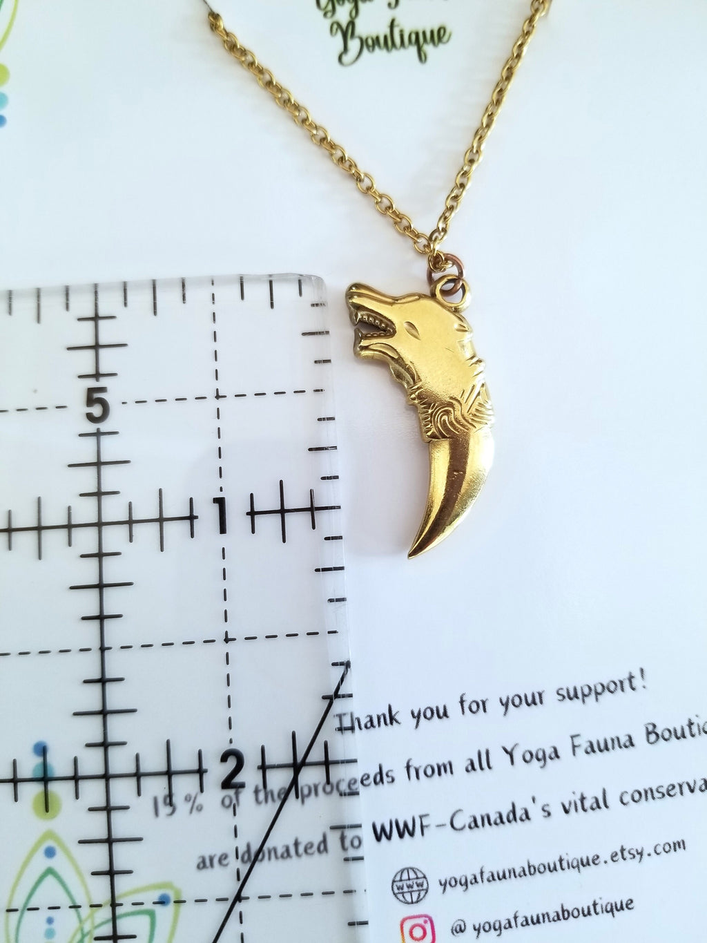 Gold Wolf Tooth Necklace: 18k Plated Stainless Steel Pendant