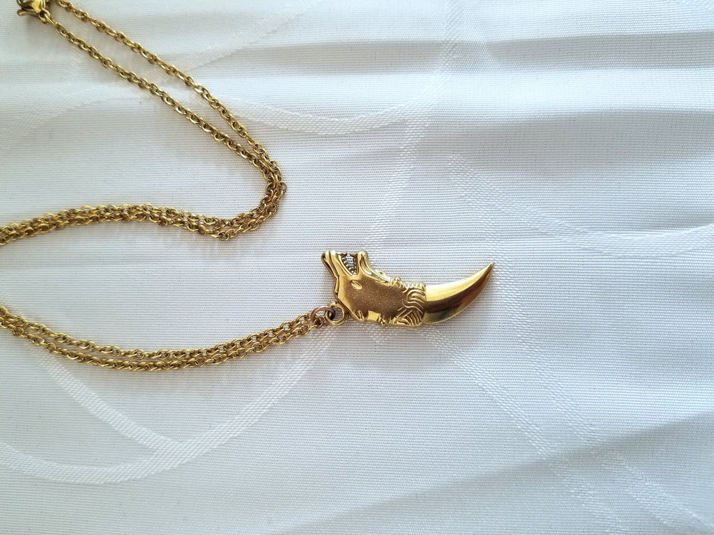 Gold Wolf Tooth Necklace: 18k Plated Stainless Steel Pendant