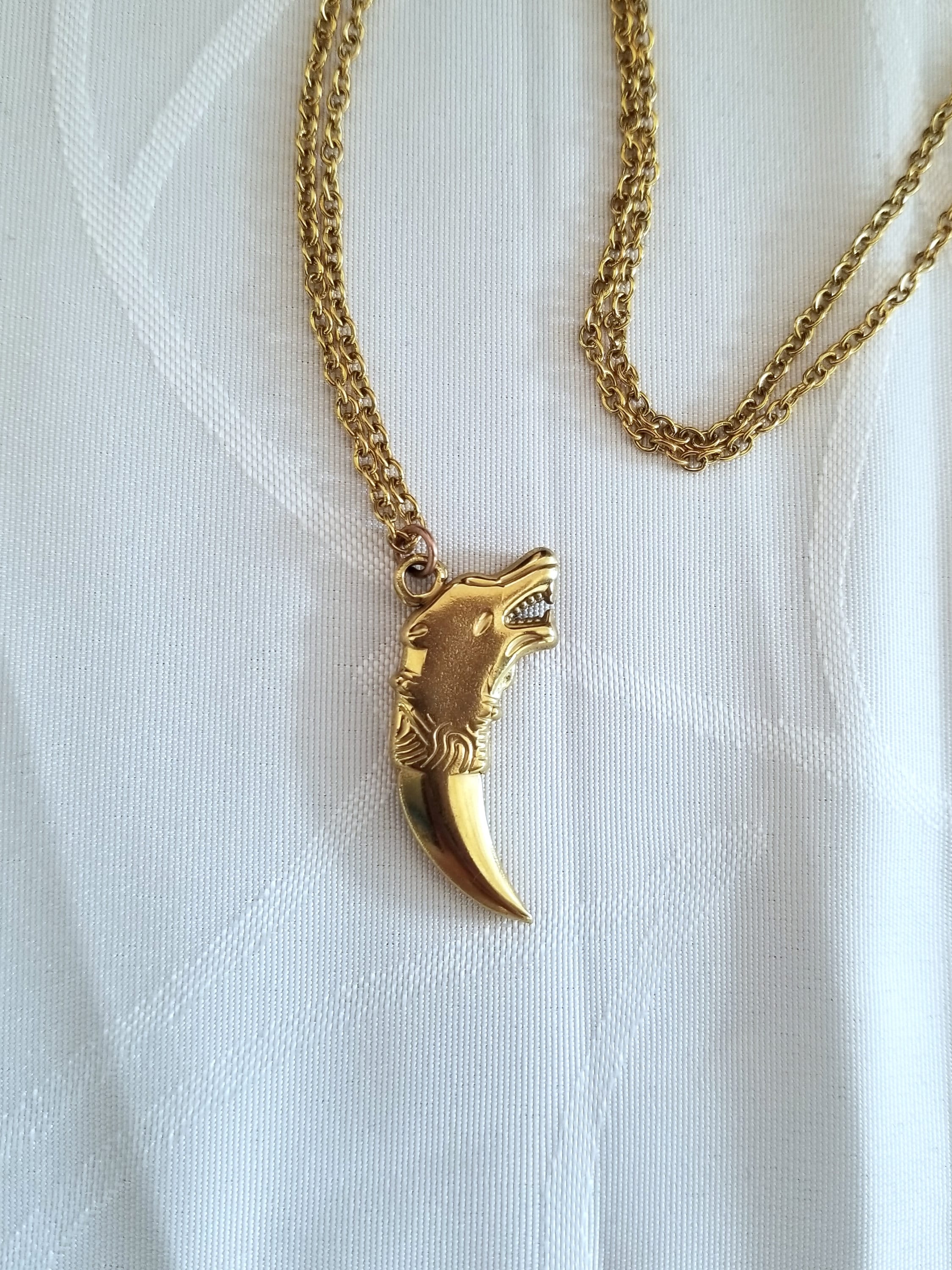 Gold Wolf Tooth Necklace: 18k Plated Stainless Steel Pendant