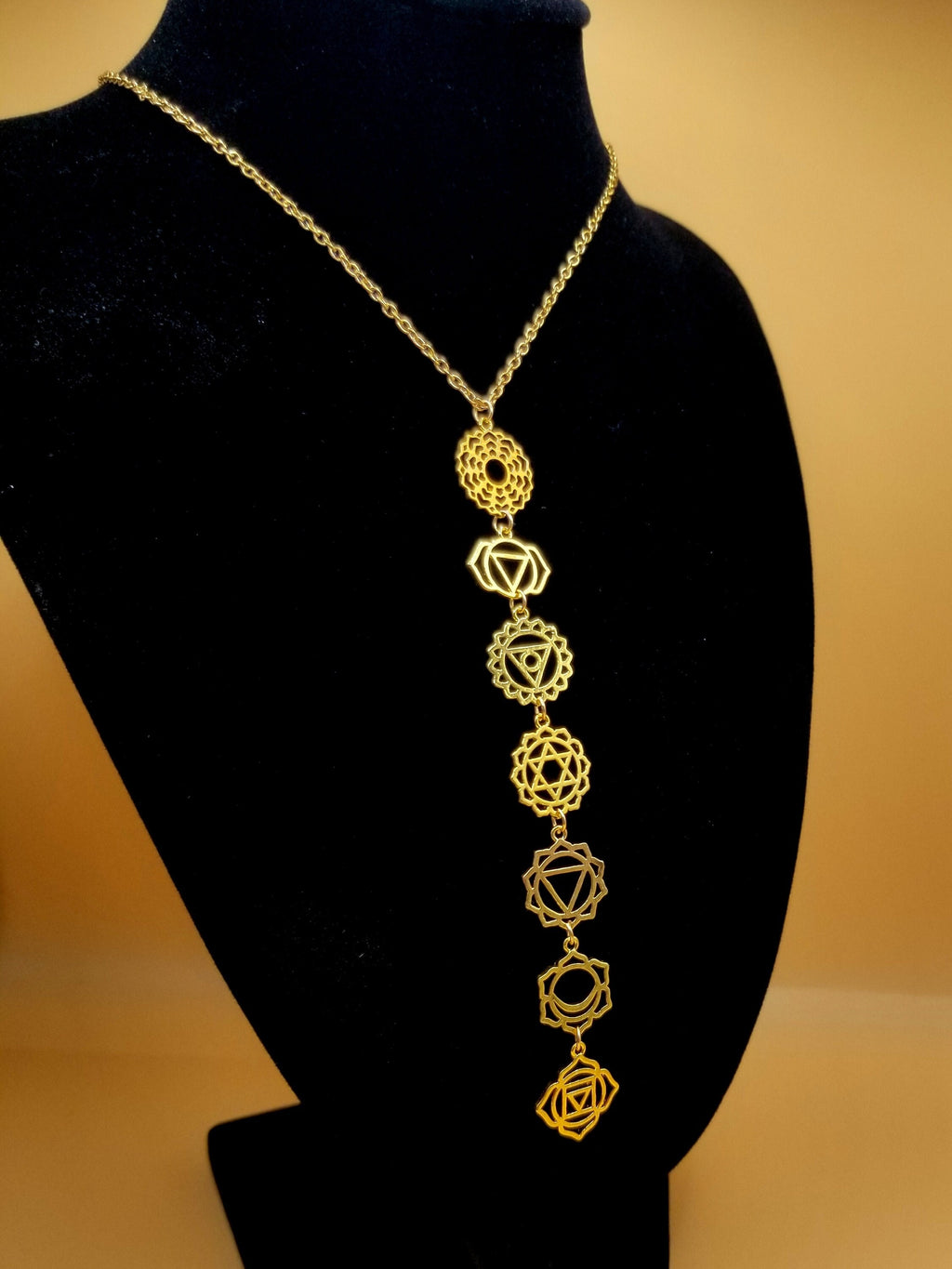 Gold chakra symbols necklace