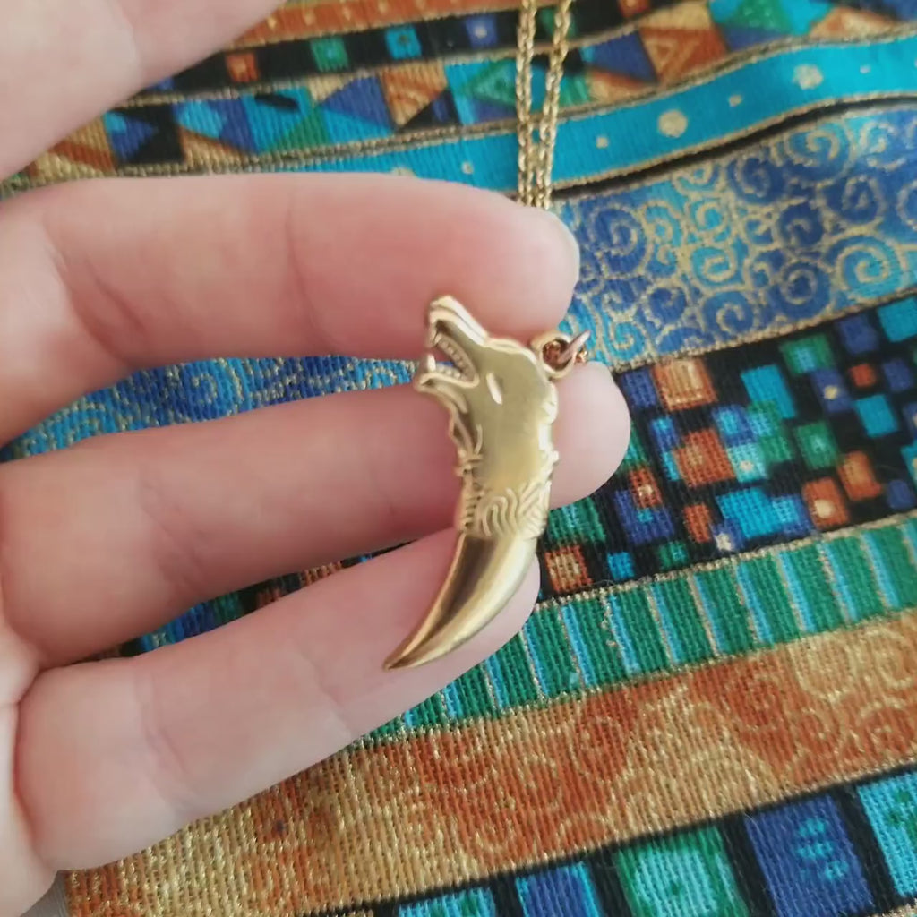 Gold Wolf Tooth Necklace: 18k Plated Stainless Steel Pendant
